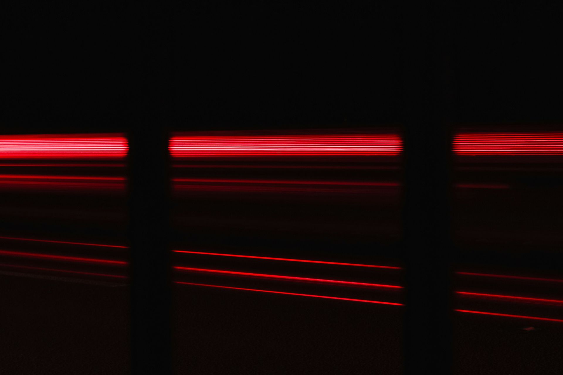 a blurry photo of a red light in the dark